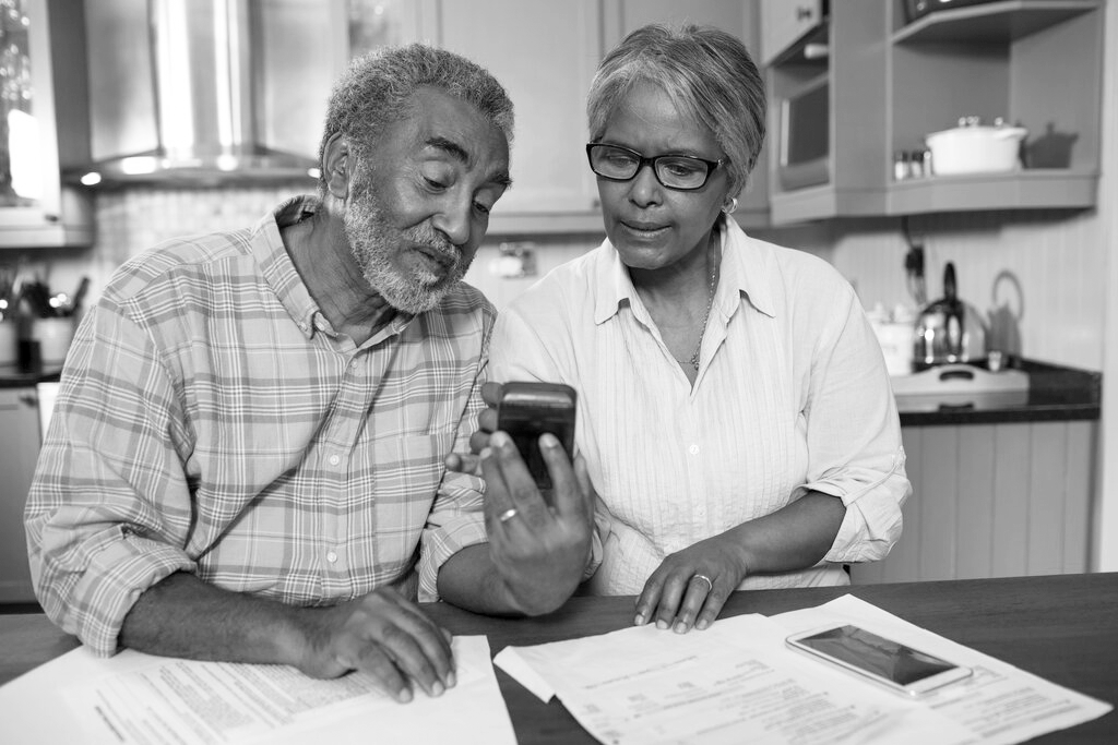 Two Retirees Doing Financial Planning