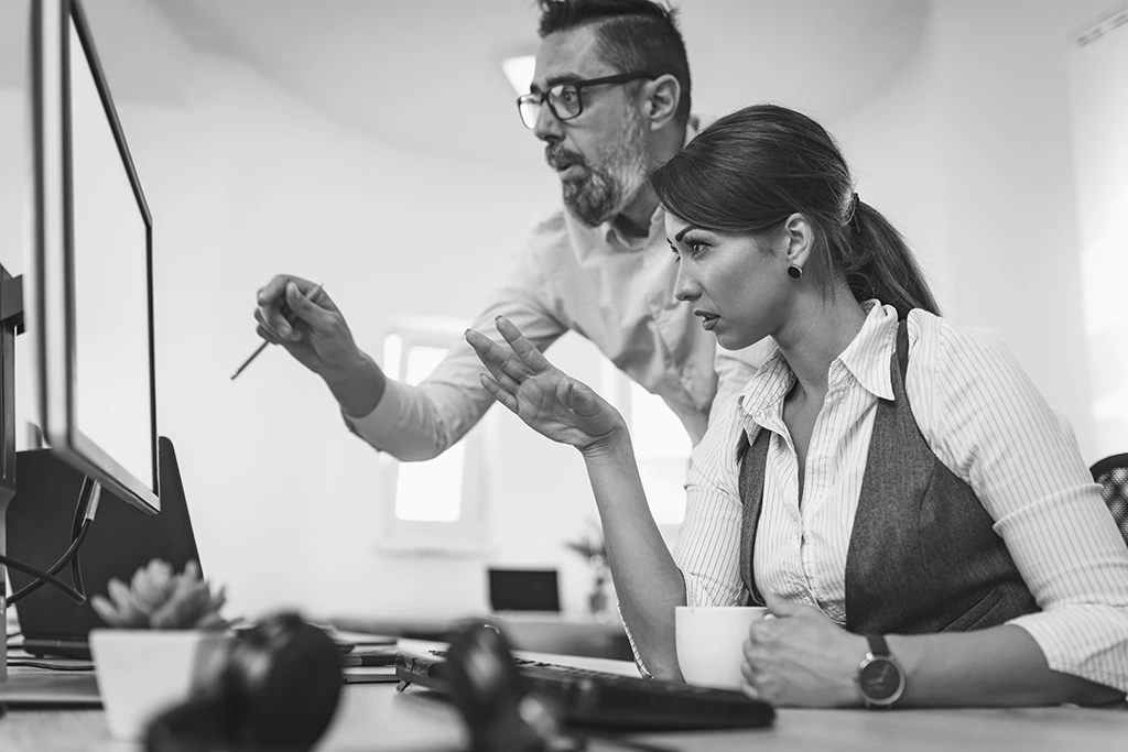 Advisors Doing Social Security Planning in a Black & White Photo